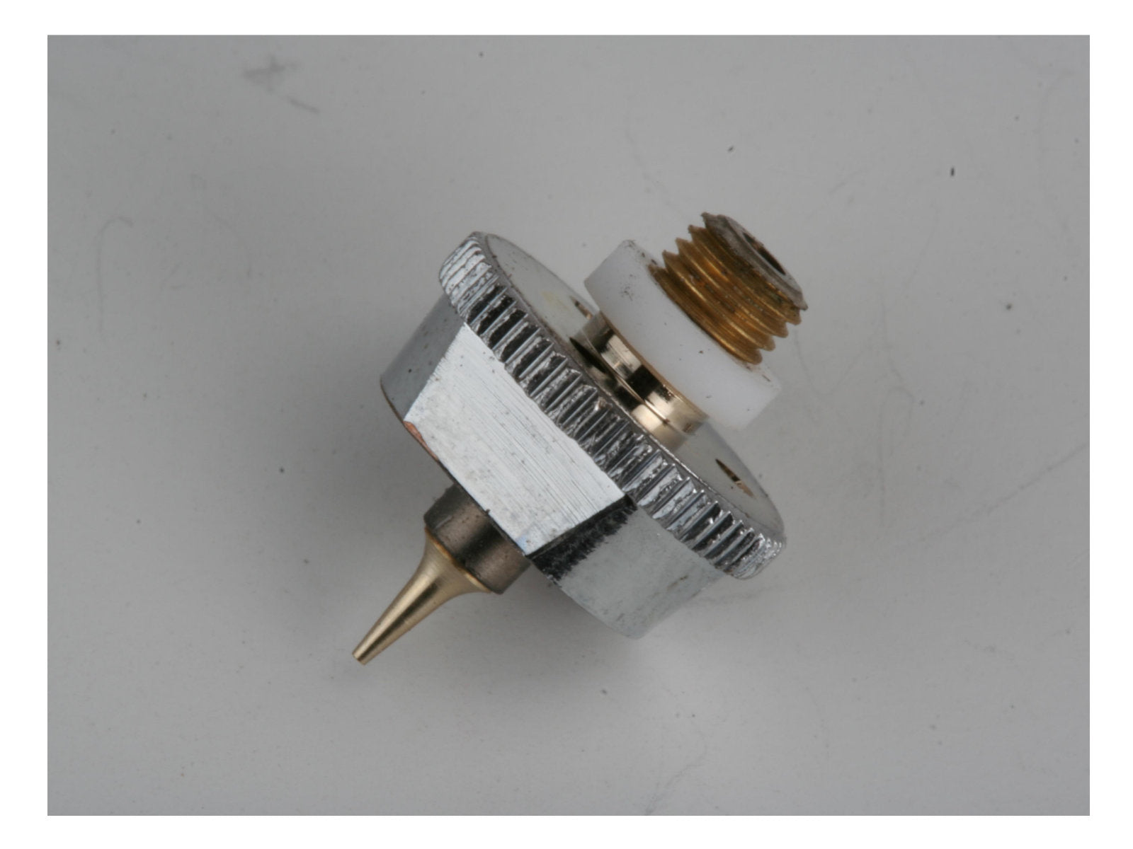 Head with nozzle