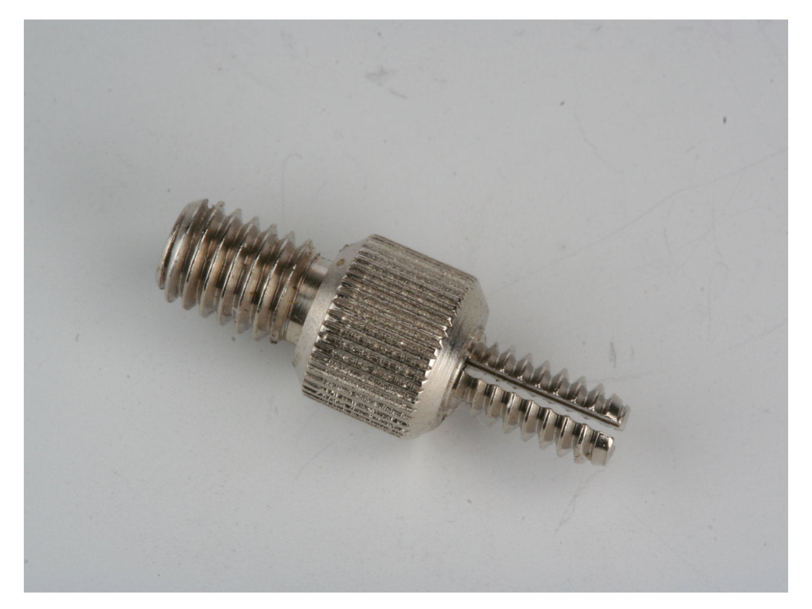 Needle chuck nut